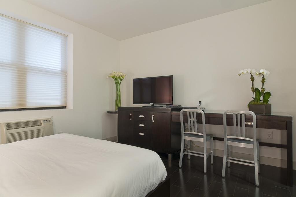 Metro Apartments Ню Йорк Стая снимка