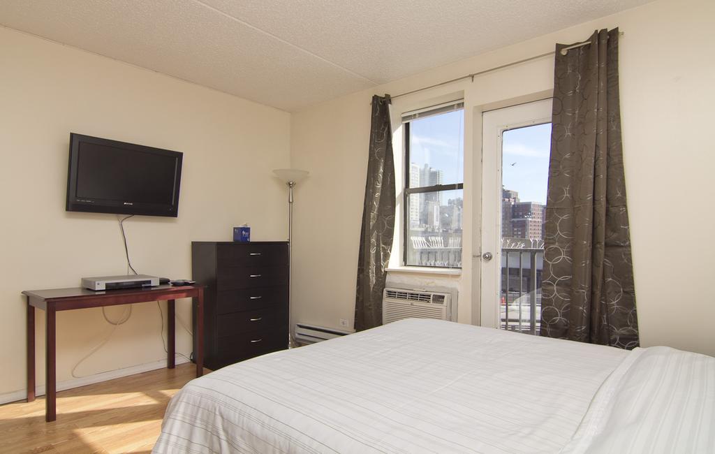 Metro Apartments Ню Йорк Стая снимка